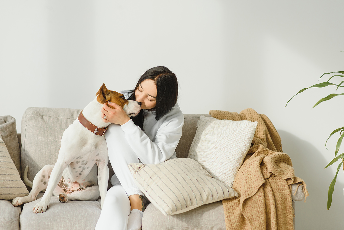 Young woman with her cute dog in georgia